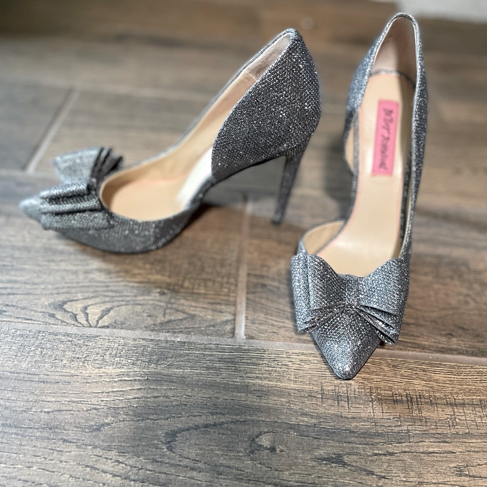 Sparkling metallic fabric covers these pumps from Betsey Johnson.